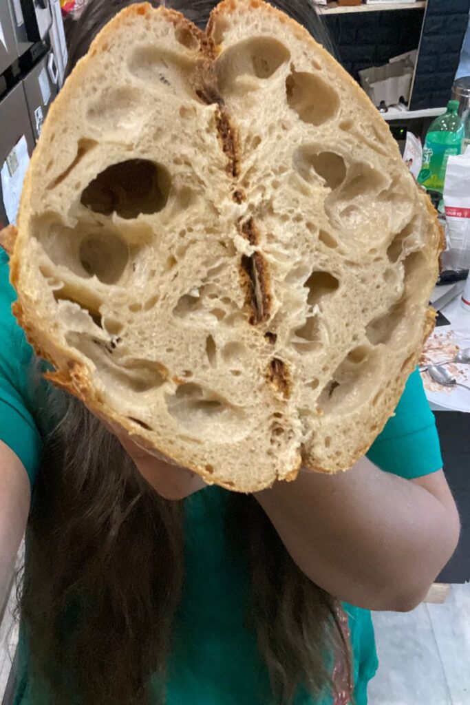 My very first loaf of sourdough bread in our tiny kitchen